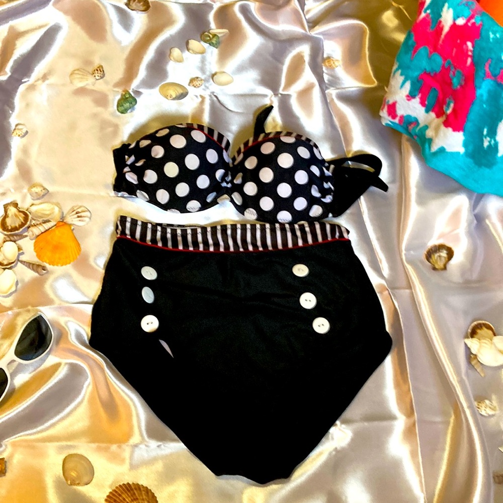 Black and white bathing suit.  Size large.  In great condition.